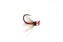 Fishing fly with pink body and black and red pattern on a white background